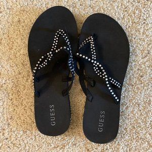 GUESS brand black rhinestone flip flops (size 7/8)